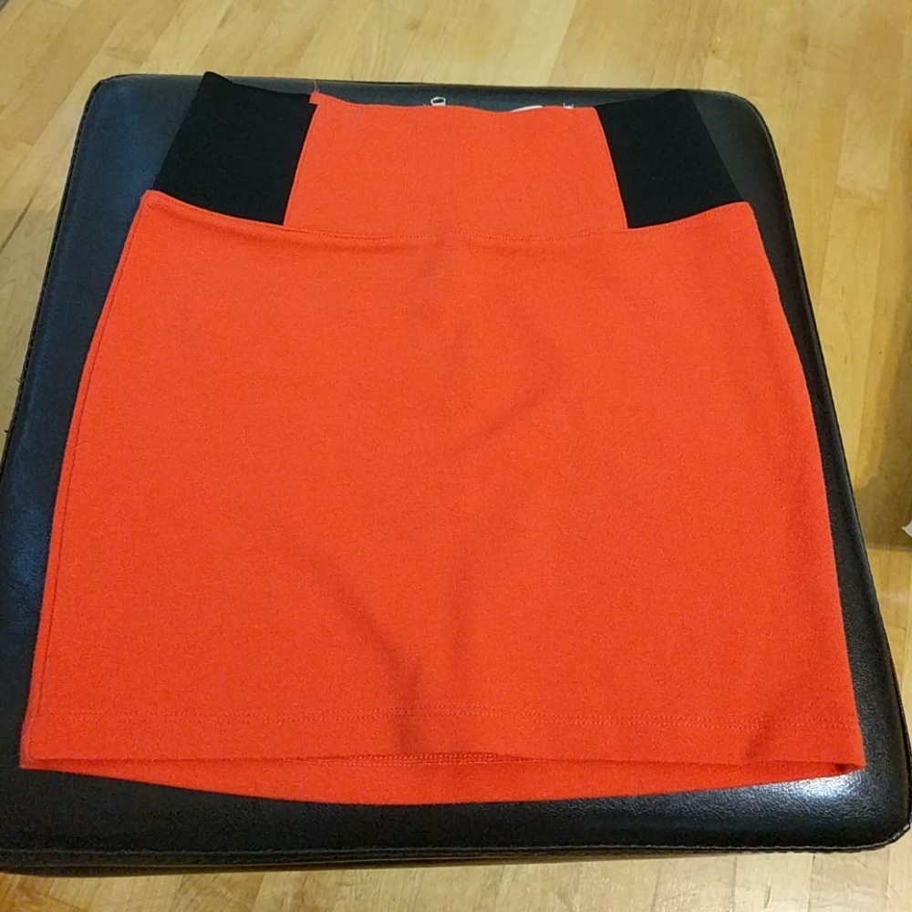 Red body con skirt, size XS